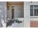 Welcoming front entry with security door and 'Welcome' doormat at 5217 Caspian Springs Dr # 101, Las Vegas, NV 89120
