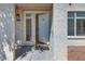 Open front door reveals the interior of the condo unit at 5217 Caspian Springs Dr # 101, Las Vegas, NV 89120