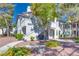 Well-maintained condo building with manicured landscaping and mature trees at 5217 Caspian Springs Dr # 101, Las Vegas, NV 89120