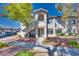 Charming condo with well-kept grounds, flowering bushes, and allocated parking at 5217 Caspian Springs Dr # 101, Las Vegas, NV 89120