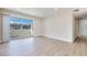 Bright open living area with sliding doors to outdoor balcony at 5217 Caspian Springs Dr # 101, Las Vegas, NV 89120