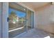 Private patio features a sliding glass door entry, allowing natural light, and outdoor space at 5217 Caspian Springs Dr # 101, Las Vegas, NV 89120