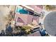 An aerial view shows the home's backyard pool, surrounding landscape, and patio at 5221 Crooked River Cir, Las Vegas, NV 89149