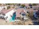 Aerial view of home showcasing the private backyard pool, patio, and well-manicured landscaping at 5221 Crooked River Cir, Las Vegas, NV 89149