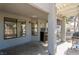 Covered back patio featuring an outdoor bar, barbeque, and outdoor seating area at 5221 Crooked River Cir, Las Vegas, NV 89149