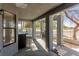 Cozy covered patio featuring a built-in grill, bar, and view of the community area at 5221 Crooked River Cir, Las Vegas, NV 89149