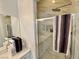 Elegant bathroom featuring a spacious marble shower with modern fixtures at 5422 Nestled Moon Ct, Las Vegas, NV 89131
