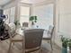 Bright breakfast nook with a glass table and natural light at 5422 Nestled Moon Ct, Las Vegas, NV 89131