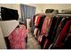 Walk-in closet with organized clothing racks and ample storage space at 5422 Nestled Moon Ct, Las Vegas, NV 89131