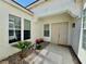 Welcoming front entrance with double doors and manicured landscaping at 5422 Nestled Moon Ct, Las Vegas, NV 89131