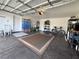 Spacious garage with overhead storage, bicycles, and ample room for parking at 5422 Nestled Moon Ct, Las Vegas, NV 89131