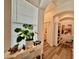 Bright hallway with archway, elegant decor, and natural light creating a welcoming ambiance at 5422 Nestled Moon Ct, Las Vegas, NV 89131