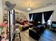 Comfortable living room with elegant furnishings and bright natural light at 5422 Nestled Moon Ct, Las Vegas, NV 89131