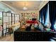 Bright living area featuring a stylish chandelier and plush seating, perfect for relaxation at 5422 Nestled Moon Ct, Las Vegas, NV 89131