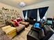 Inviting living room with plush seating, stylish decor, and ample natural light at 5422 Nestled Moon Ct, Las Vegas, NV 89131