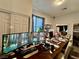 Functional office area with dual monitors and comfortable seating at 5422 Nestled Moon Ct, Las Vegas, NV 89131