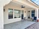 Outdoor patio with a ceiling fan, textured walls, and comfortable seating at 5422 Nestled Moon Ct, Las Vegas, NV 89131