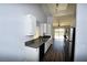 Updated kitchen overlooking the backyard with stainless steel appliances and modern cabinetry at 5521 Desert Valley Dr, Las Vegas, NV 89149