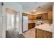Kitchen with stainless steel appliances, wooden cabinets, and an open layout at 5915 Nuevo Leon St # 8, North Las Vegas, NV 89031