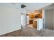 Bright kitchen featuring wooden cabinets and stainless steel refrigerator at 5915 Nuevo Leon St # 8, North Las Vegas, NV 89031