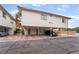 Condo with parking garage and a view of the address 6711 at 6711 W Charleston Blvd # 2, Las Vegas, NV 89146
