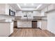 Charming kitchen with granite countertops and stainless steel appliances at 6711 W Charleston Blvd # 2, Las Vegas, NV 89146