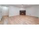 Bright living room with fireplace, new flooring, and ample space at 6711 W Charleston Blvd # 2, Las Vegas, NV 89146