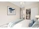 Stylishly decorated bedroom with closet view and featuring a serene atmosphere at 6907 May Basket Ave, Las Vegas, NV 89131