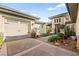 Charming home featuring a well-manicured front yard, a two-car garage and inviting curb appeal at 6907 May Basket Ave, Las Vegas, NV 89131