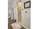 Bathroom features a shower stall with glass doors and neutral tile flooring at 7020 Puetollano Dr, North Las Vegas, NV 89084