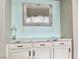 Butler's pantry with white marble counters and drawers with hardware at 7020 Puetollano Dr, North Las Vegas, NV 89084