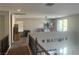 Spacious upstairs loft with carpet flooring, lots of light, and an upstairs deck at 7020 Puetollano Dr, North Las Vegas, NV 89084