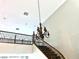 A beautiful staircase leads up to the second floor at 7020 Puetollano Dr, North Las Vegas, NV 89084
