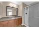 Bathroom featuring a granite vanity, shower, and tile floor at 7200 Pirates Cove Rd # 1011, Las Vegas, NV 89145