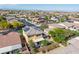 Aerial view showcasing the home, landscaped backyard, and solar panels at 7417 Horizon Rock Ave, Las Vegas, NV 89179