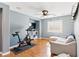 Finished bonus room with wood floors, ceiling fan, and ample natural light at 7417 Horizon Rock Ave, Las Vegas, NV 89179