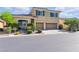 Charming two-story home featuring a landscaped front yard and a two-car garage at 7417 Horizon Rock Ave, Las Vegas, NV 89179