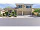 Charming two-story home with a well-maintained lawn and a spacious two-car garage at 7417 Horizon Rock Ave, Las Vegas, NV 89179