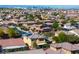 Expansive view of closely packed neighborhood homes with terracotta roofs near the Las Vegas skyline at 7417 Horizon Rock Ave, Las Vegas, NV 89179