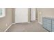 Bedroom including closet and exterior doors, along with a dresser at 7428 Alamo Ranch Ave, Las Vegas, NV 89179