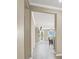 Hallway showcasing the open floor plan with views of the living and dining areas at 7428 Alamo Ranch Ave, Las Vegas, NV 89179