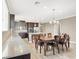 Kitchen features an eat-in kitchen, granite countertops, stainless steel appliances and an open floor plan at 7428 Alamo Ranch Ave, Las Vegas, NV 89179