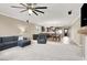 Open-concept living room provides ample living space, complemented by easy access to the kitchen at 7428 Alamo Ranch Ave, Las Vegas, NV 89179