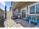 Charming back patio featuring a seating area and colorful rug, ideal for relaxation at 7515 Emerald Stars St # 102, North Las Vegas, NV 89084