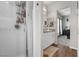 Bright bathroom featuring a walk-in shower, vanity with granite countertop, and access to the main bedroom at 7515 Emerald Stars St # 102, North Las Vegas, NV 89084