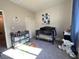 Charming bedroom with a crib, changing table, and cozy decor at 7515 Emerald Stars St # 102, North Las Vegas, NV 89084