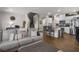 Open concept living space with kitchen, living and dining area at 7515 Emerald Stars St # 102, North Las Vegas, NV 89084