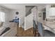Living space featuring an open floor plan and a staircase at 7515 Emerald Stars St # 102, North Las Vegas, NV 89084