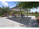 Neighborhood park pavilion with picnic tables, perfect for outdoor gatherings at 7515 Emerald Stars St # 102, North Las Vegas, NV 89084