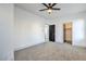 This main bedroom is spacious with a modern ceiling fan, en-suite bath, and walk-in closet at 7849 Montour Falls St, Las Vegas, NV 89149